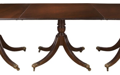 A George III style mahogany dining table 20th Century....