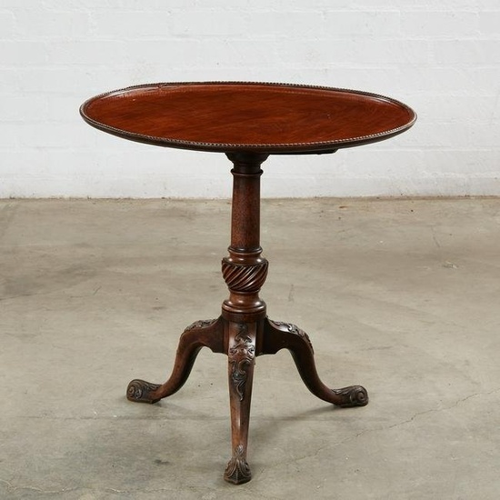 A George III style mahogany tilt top tripod table