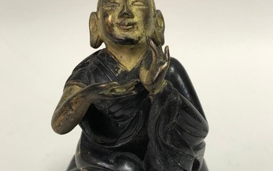 A Gilt and Patinated Figure of Lama, Tibet 18th Century.