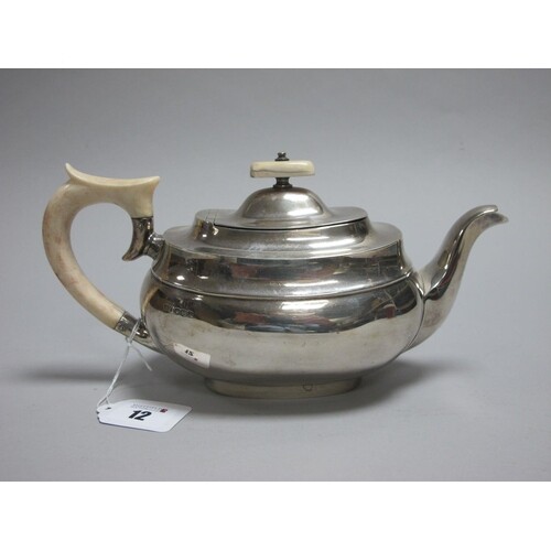 A Hallmarked Silver Tea Pot, EV, Sheffield 1939, of plain ro...