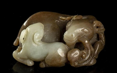 A JADE CARVING OF TWO RAMS China, 20th century