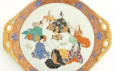 A Japanese twin handled plate with hand painted