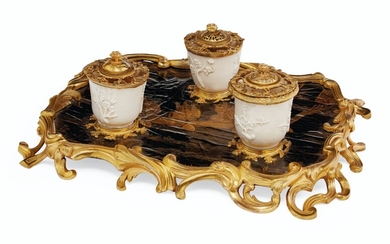 A LOUIS XV ORMOLU-MOUNTED BLACK AND GILT-LACQUER AND CHINESE DEHUA CUPS ENCRIER, THE MOUNTS CIRCA 1740, THE CUPS QING DYNASTY, 18TH CENTURY