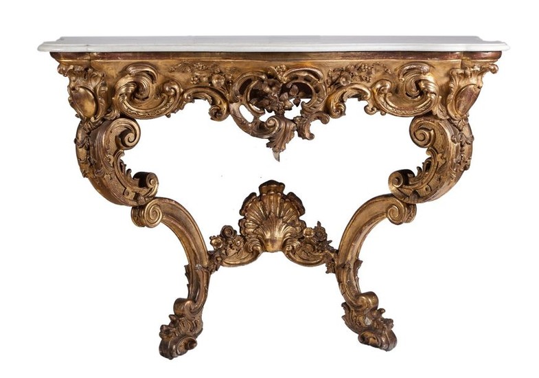 A Louis XV style marble-topped carved giltwood console...