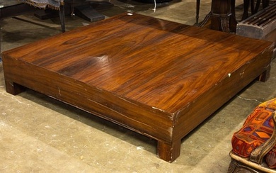 A Mexican Mid Century Modern satin wood custom table on casters