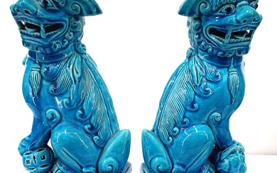 A PAIR OF CHINESE TURQUOISE GLAZED FOO DOGS