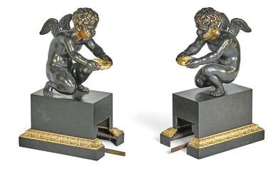 A PAIR OF PATINATED & GILT BRONZE FIGURAL FIRE FENDER