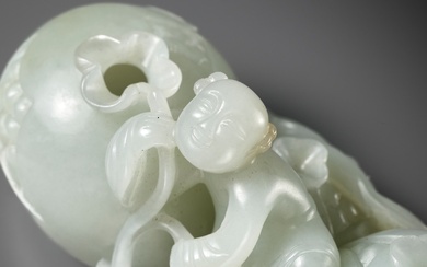 A PALE CELADON JADE 'POMEGRANATE AND BOYS' VASE GROUP, QIANLONG PERIOD