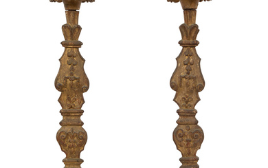 A Pair of Italian Baroque Style Carved Giltwood Pricket Sticks