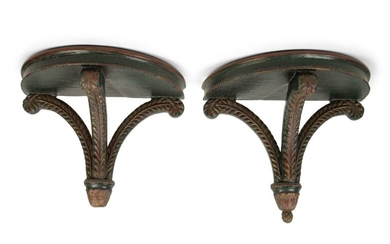 A Pair of Regency Style Black and Gilt Decorated Wall Brackets