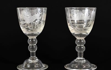 A Pair of Wine Glasses, circa 1740, the rounded funnel...