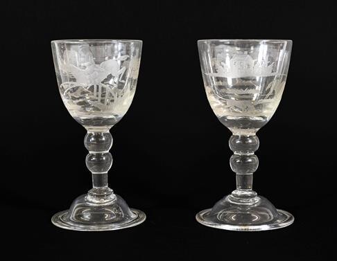 A Pair of Wine Glasses, circa 1740, the rounded funnel...