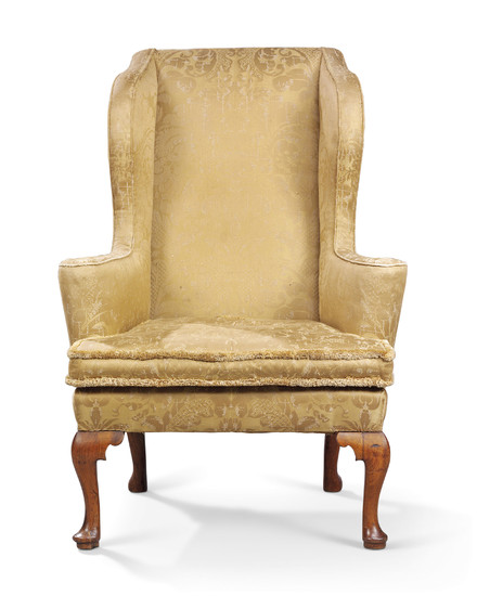 A QUEEN ANNE WALNUT WING ARMCHAIR, EARLY 18TH CENTURY