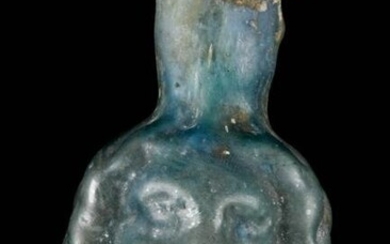 A ROMAN PALE GREEN GLASS JANUS-HEAD SPRINKLER FLASK