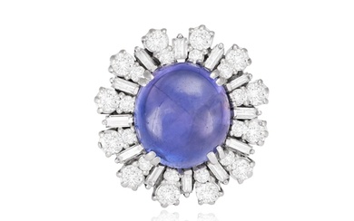 A SAPPHIRE AND DIAMOND CLUSTER RING, CIRCA 1960 The oval-sh...