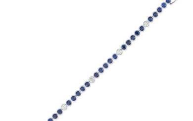 A SAPPHIRE AND DIAMOND LINE BRACELET comprising a row of round cut sapphires punctuated by round