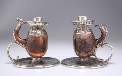 A STRIKING PAIR OF VICTORIAN SILVER-MOUNTED CHAMBERSTICKS