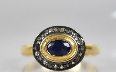 A Sapphire and Diamond Mounted Ring, Oval Cut Collet Mounted...