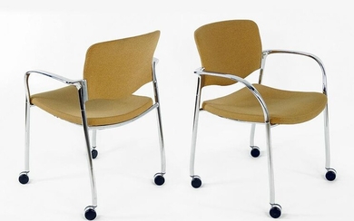 A Set Of Twelve Stylex Stacker Chairs.