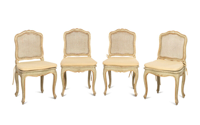 A Set of Four Louis XV Style Painted and Parcel Gilt Dining Chairs