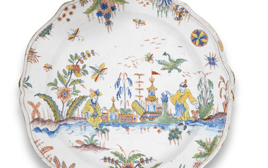 A Sinceny or Rouen faience dish with chinoiserie figures, circa 1740
