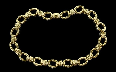 A Tiffany & Company 18 Karat Yellow Gold Necklace.