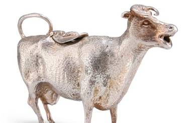 A VICTORIAN SILVER-PLATED COW CREAMER, realistically