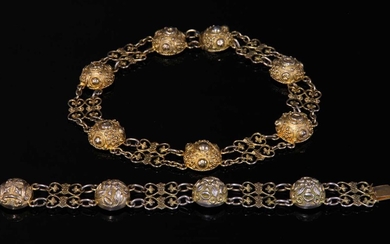 A Victorian silver gilt necklace and bracelet suite
