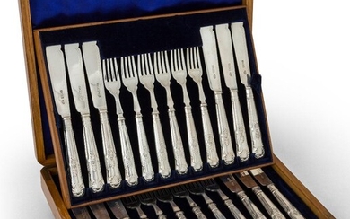 A boxed set of Edwardian silver fish eaters, London, 1902, Goldsmiths & Silversmiths Co., comprising twelve each fish forks and knives with King's pattern terminals, in original fitted wooden box