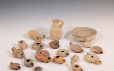 A collection of Roman terracotta oil lamps, two bottles and a bowl, ca. 2nd century AD;