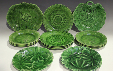 A collection of Wedgwood green glazed majolica dessert dishes, late 19th century, including four sun