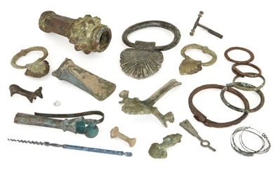 A collection of bronze and iron items, including a macehead, handles, Iron Age and later (18) Provenance: The macehead Sotheby's, May 1993; the handles ex-Horatio and Patsy Melas Collection