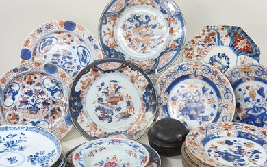 A collection of twelve 18th century Imari porcelain plates, each...