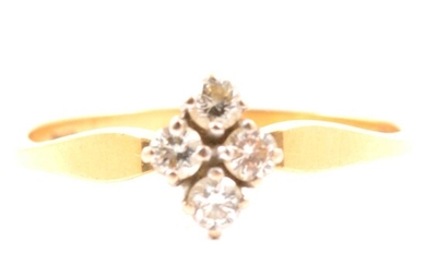A diamond four stone ring.