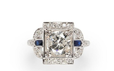 A diamond, sapphire and eighteen karat white gold ring