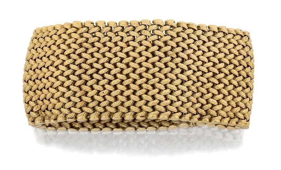 A flexible broad bracelet, of weave-design, stamped 750, approx. length 19.2cm