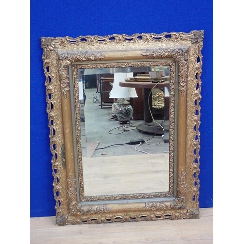 A gilt framed Wall Mirror with bevelled glass 2ft 10in H x 2...