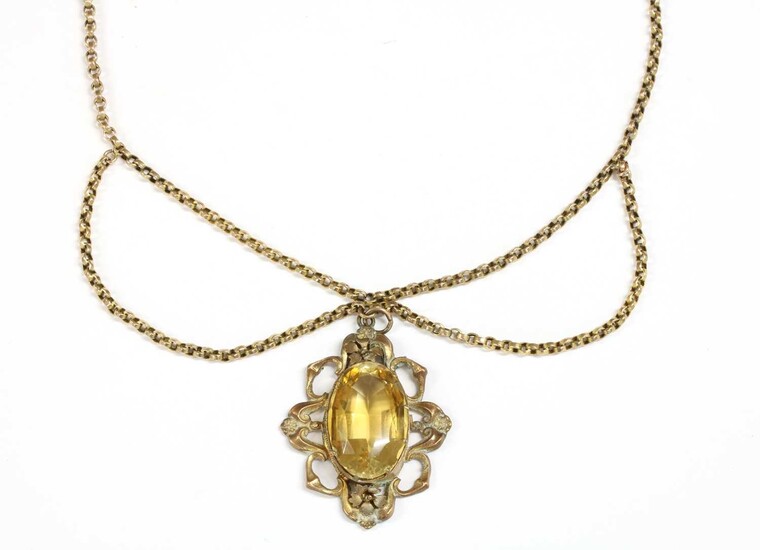 A gilt metal citrine pendant