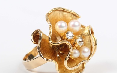 A gold, diamond and cultured pearl ring, mounted with two old cut diamonds and four cultured pearls
