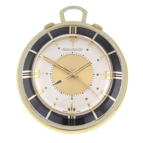 A gold plated alarm travel clock by Jaeger-LeCoultre.