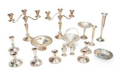 A group of weighted sterling silver and silver-plated items