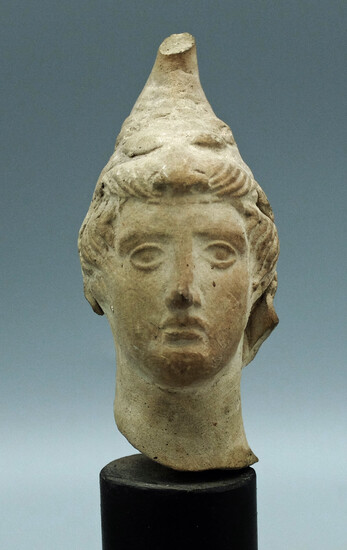 A handsome Greek terracotta head of a youth