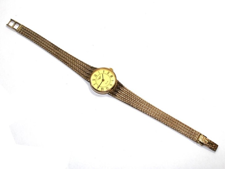 A ladies 9 carat gold Longines wristwatch with an integral b...