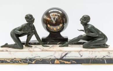 A large 1930's Art Deco mantle clock with globe face...