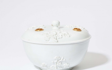 A large Meissen Böttger porcelain dish and cover with floral reliefs