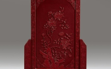 A large well-carved Chinese cinnabar lacquer screen