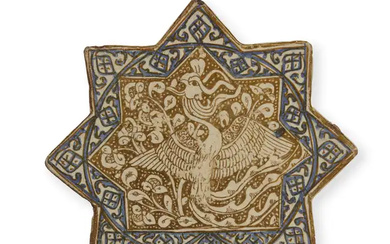 A lustre and cobalt blue border star pottery tile Kashan, central Iran,...