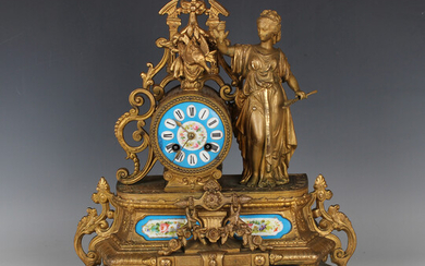 A mid to late 19th century French gilt spelter and porcelain mantel clock with eight day movement st