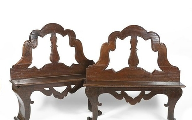 A pair of 17th century Venetian walnut benches