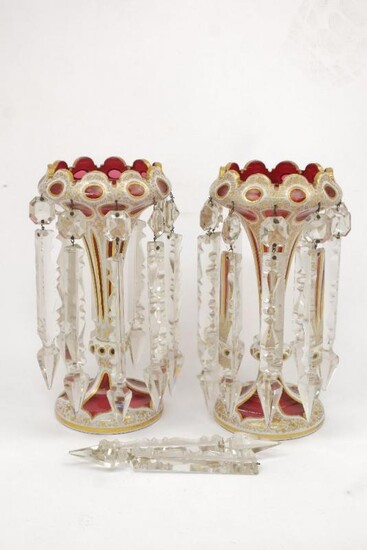 A pair of Bohemian cranberry glass lustres...